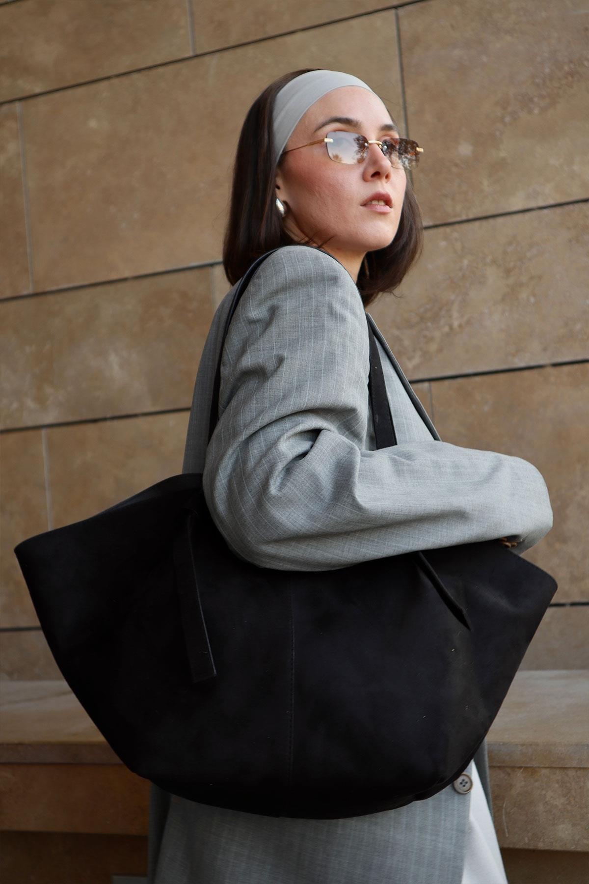 Ava Knot Suede Bag